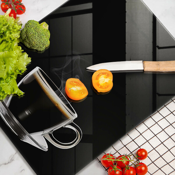 Chopping board glass A glass of hot coffee