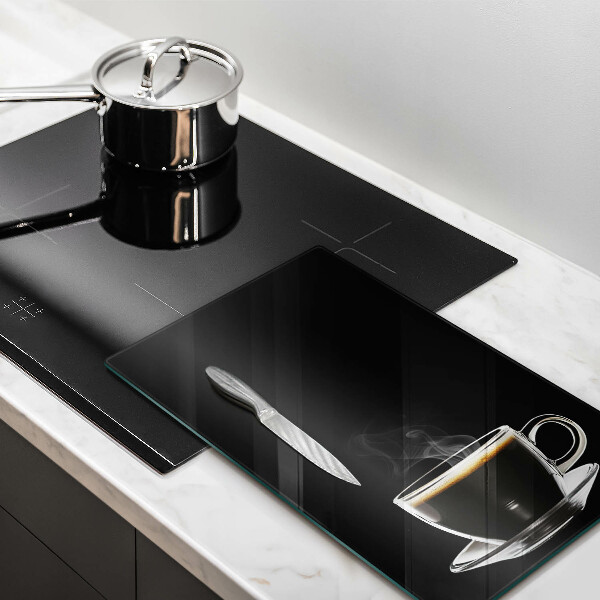 Chopping board glass A glass of hot coffee