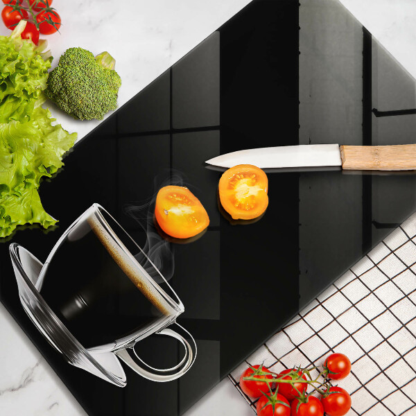 Chopping board glass A glass of hot coffee