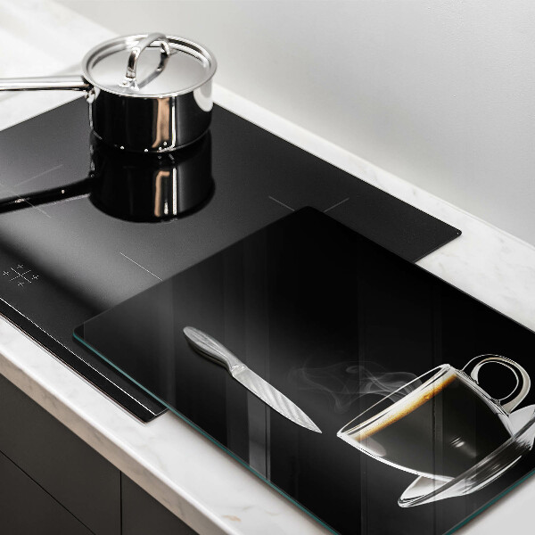 Chopping board glass A glass of hot coffee