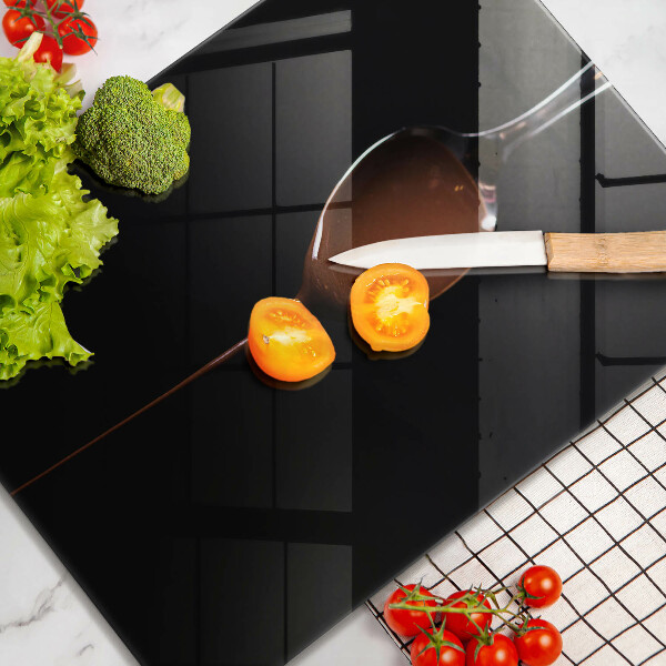 Chopping board glass Spoon of chocolate