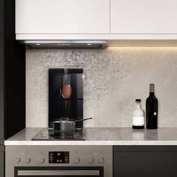 Chopping board glass Spoon of chocolate