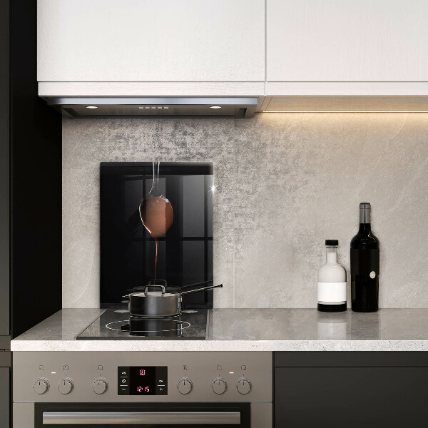 Chopping board glass Spoon of chocolate