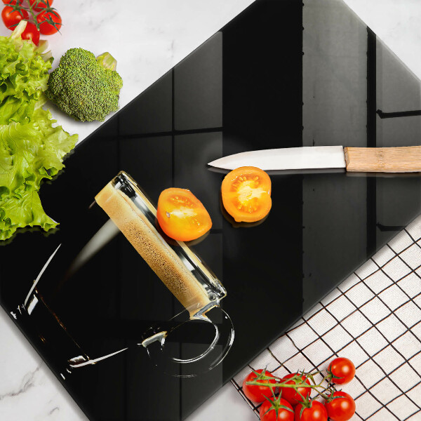 Chopping board glass A glass of black coffee