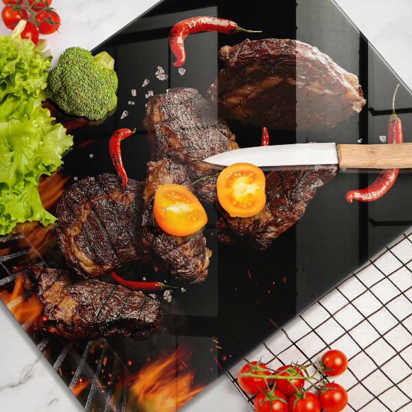 Chopping board glass Meat on the grill