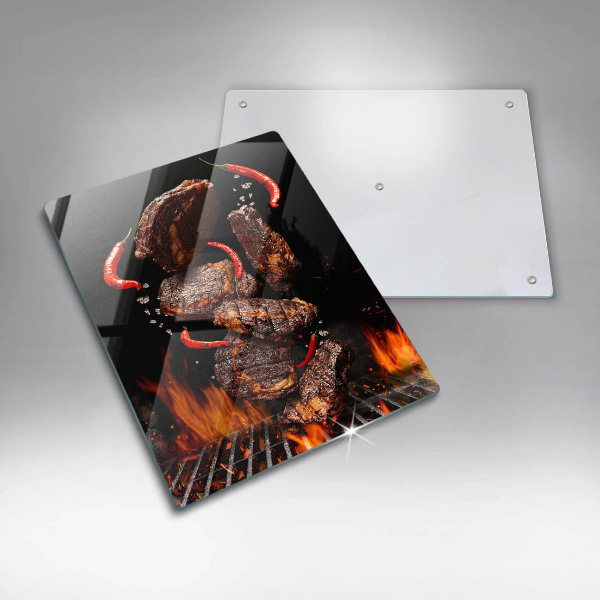 Chopping board glass Meat on the grill