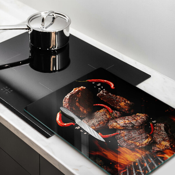 Chopping board glass Meat on the grill
