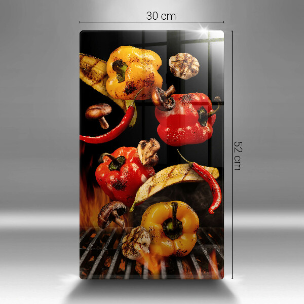 Chopping board glass Vegetables on the grill