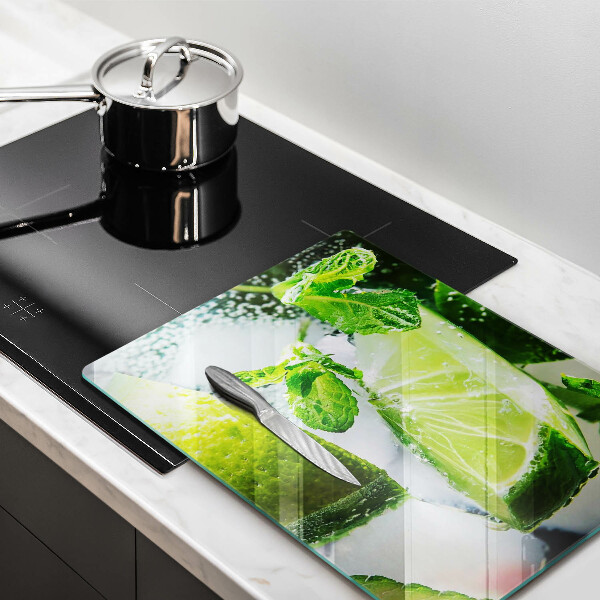 Chopping board glass Water with lime and ice