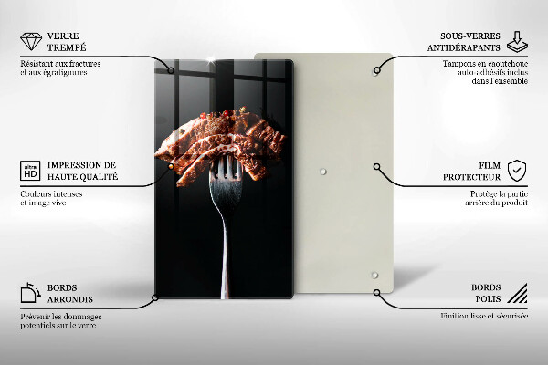 Chopping board glass Meat on a fork