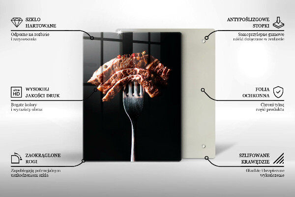 Chopping board glass Meat on a fork