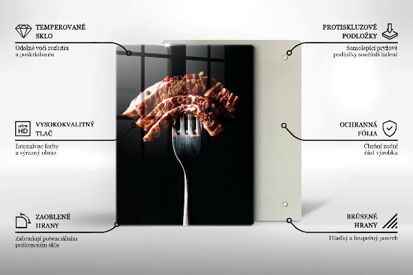 Chopping board glass Meat on a fork