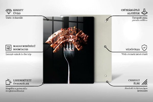 Chopping board glass Meat on a fork