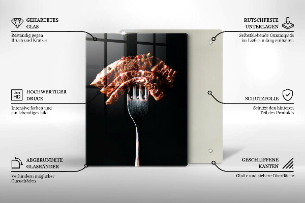 Chopping board glass Meat on a fork
