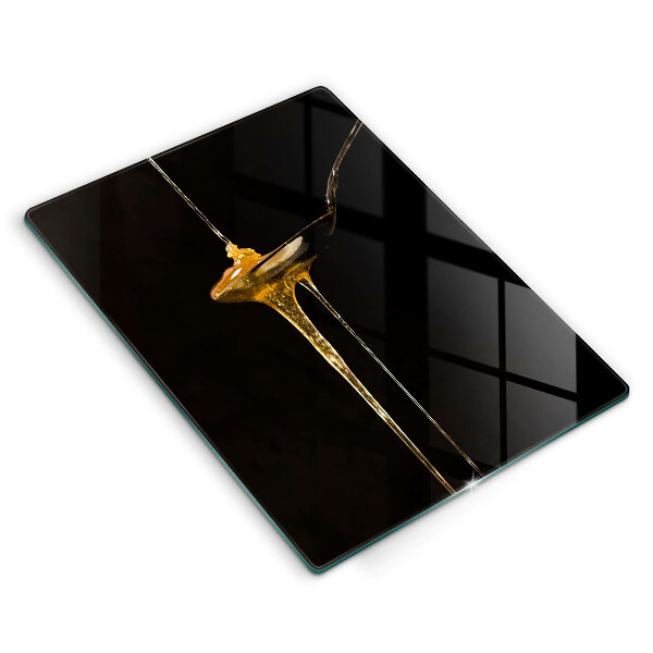 Chopping board glass A teaspoon of honey