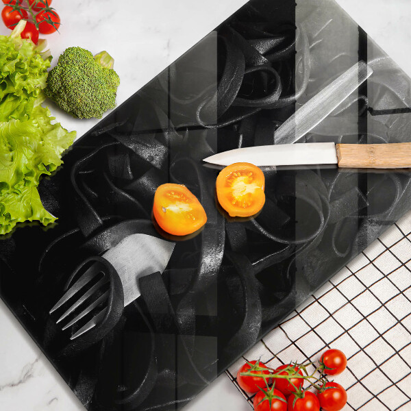 Chopping board glass Black pasta and fork