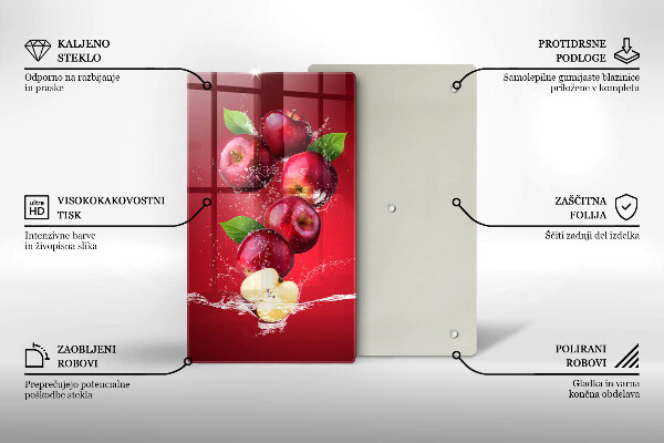 Chopping board glass Juicy apples in the water