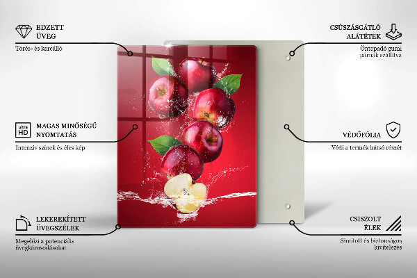 Chopping board glass Juicy apples in the water