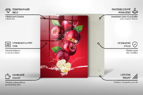 Chopping board glass Juicy apples in the water