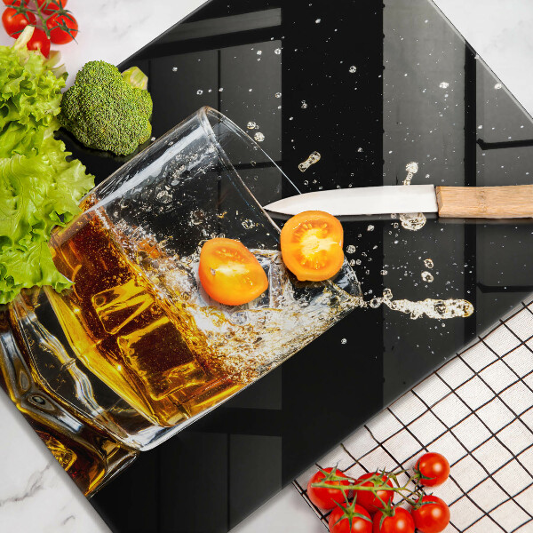 Chopping board glass A glass of whiskey