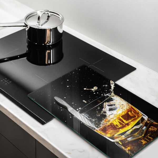 Chopping board glass A glass of whiskey