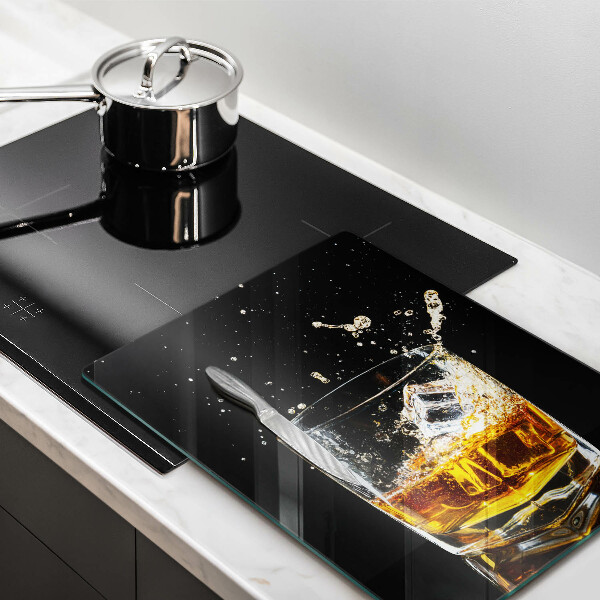Chopping board glass A glass of whiskey