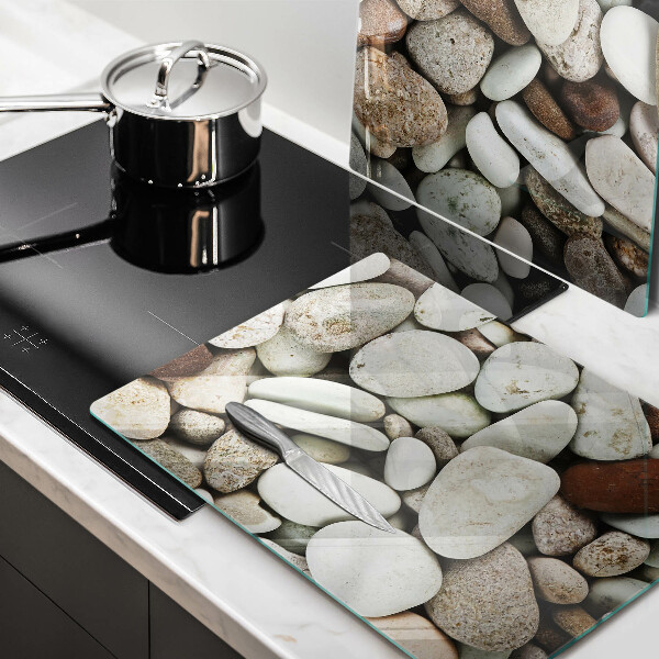 Glass chopping board Background small stones