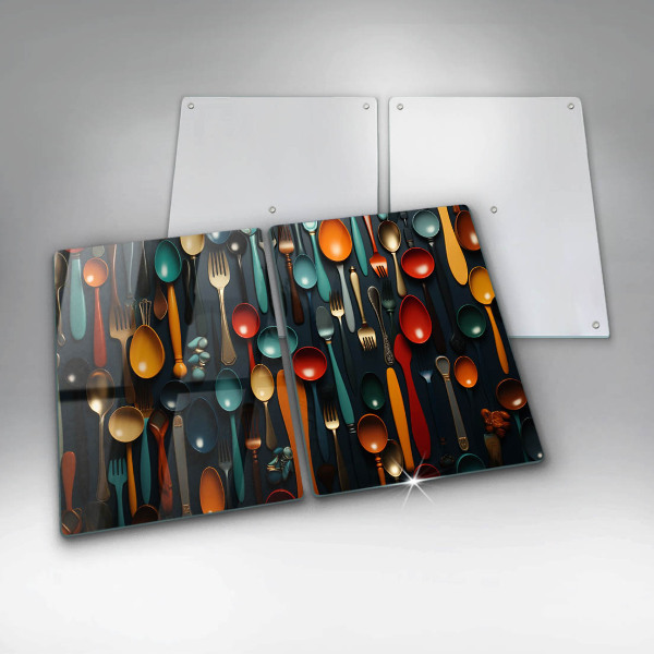 Chopping board Colorful spoons and forks