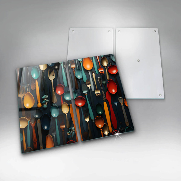 Chopping board Colorful spoons and forks