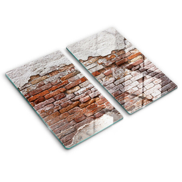 Glass chopping board Old wall of brick and concrete