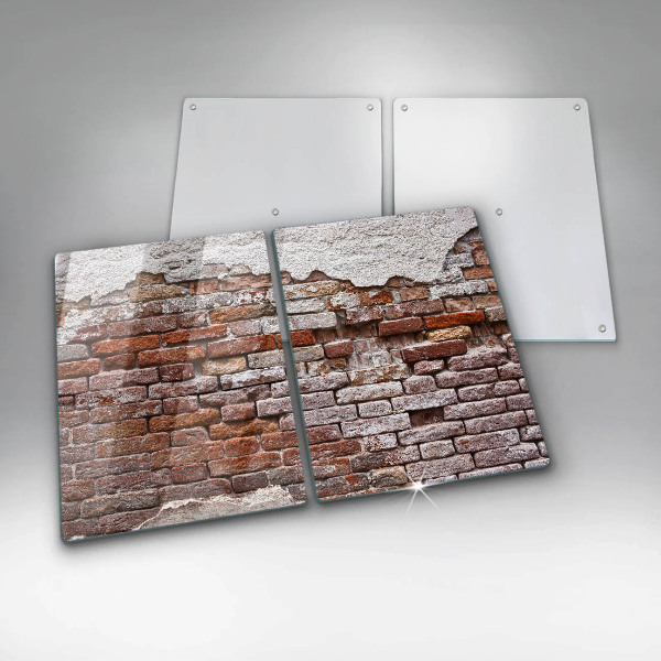 Glass chopping board Old wall of brick and concrete