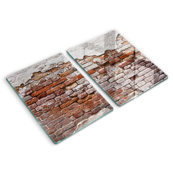 Glass chopping board Old wall of brick and concrete