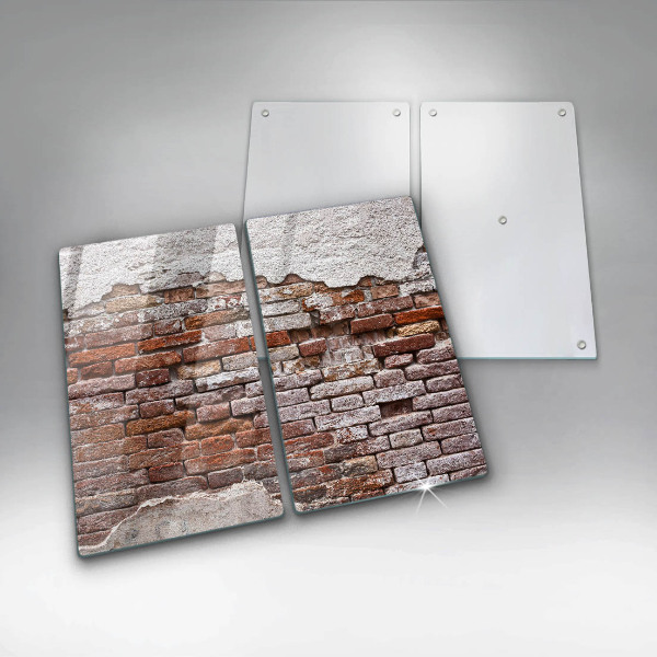 Glass chopping board Old wall of brick and concrete