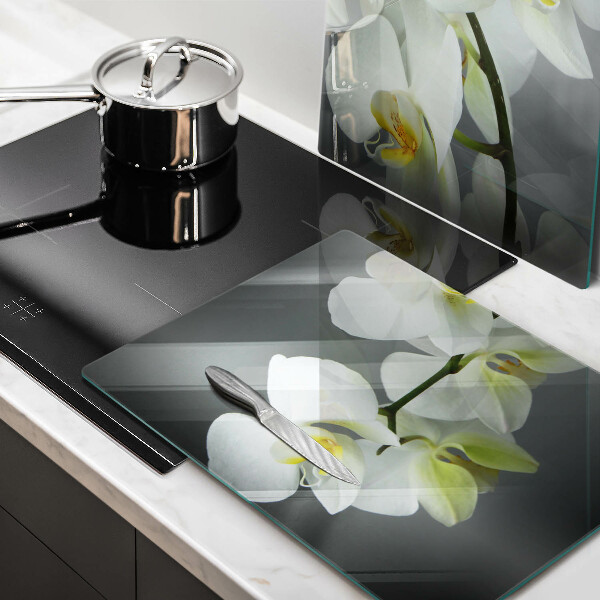 Glass chopping board White orchid flowers