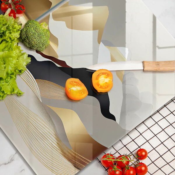 Glass chopping board Abstraction of golden mountains