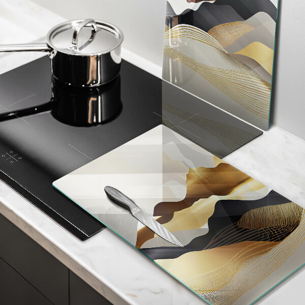 Glass chopping board Abstraction of golden mountains