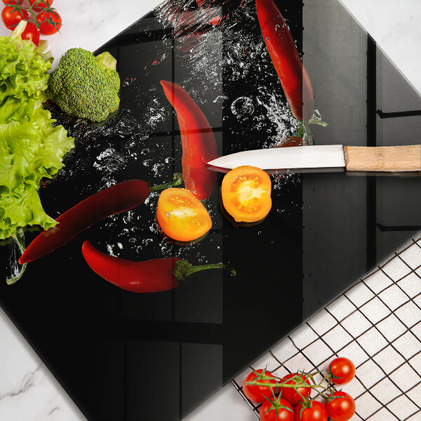 Chopping board Chili peppers in water