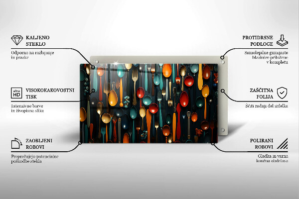 Chopping board Colorful spoons and forks