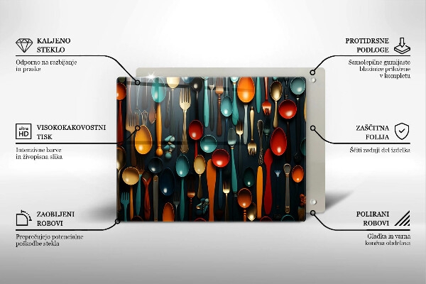 Chopping board Colorful spoons and forks