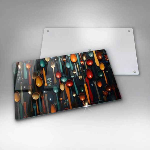 Chopping board Colorful spoons and forks