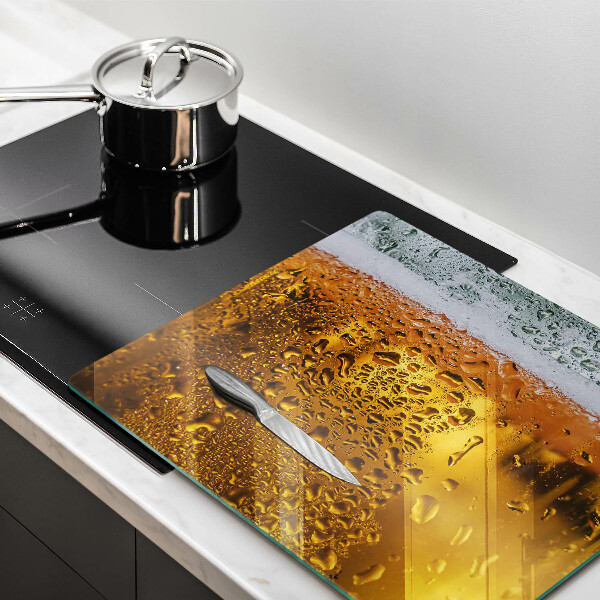 Chopping board Wet glass of beer