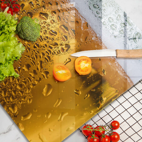 Chopping board Wet glass of beer