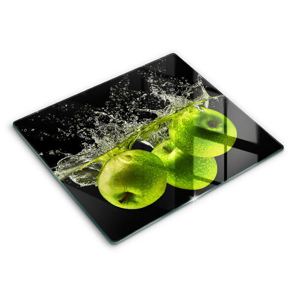 Chopping board glass Green apples and water