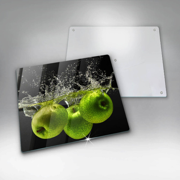 Chopping board glass Green apples and water