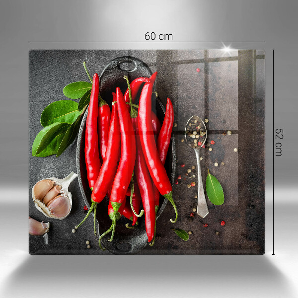 Chopping board glass Red chili peppers
