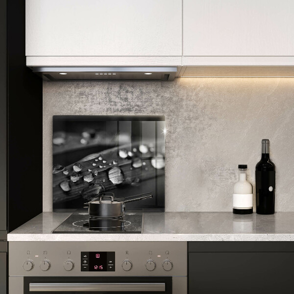 Glass worktop saver Drops of dew on the leaves