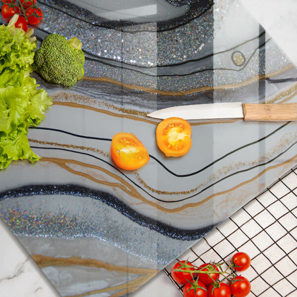 Glass worktop saver rock with gold