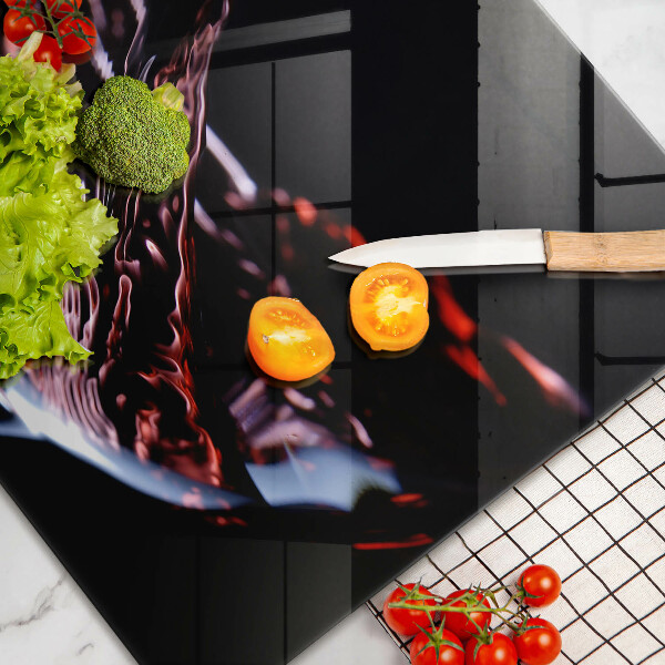 Cutting board A glass of red wine