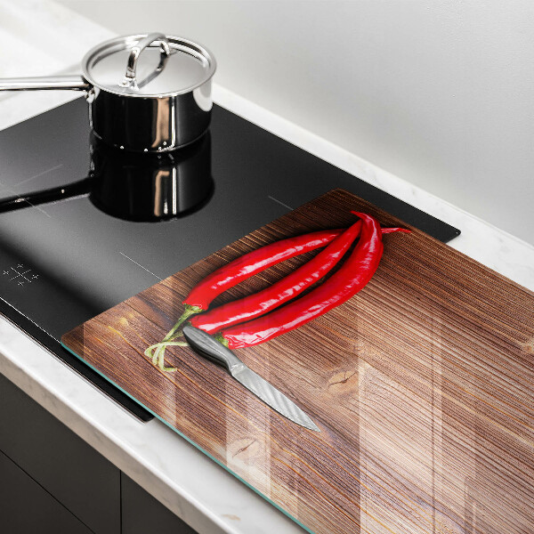 Worktop saver Chili peppers on wood