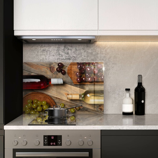 Cutting board Bottles of wine and grapes